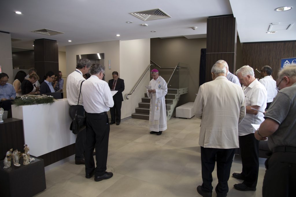 Archdiocesan employees, who moved into the new building last April, and special guests listen to Perth Archbishop Timothy Costelloe during the Blessing and Official Opening ceremony. Photo: Jamie O’Brien