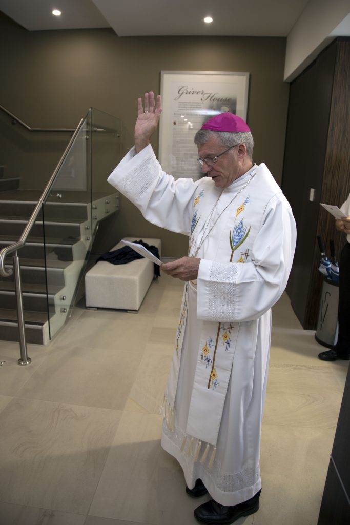 Perth Archbishop Timothy Costelloe blesses the new Office of the Archbishop and Archdiocesan Administration Centre – known as Griver House – on Thursday, 8 December 2016. Photo: Jamie O’Brien