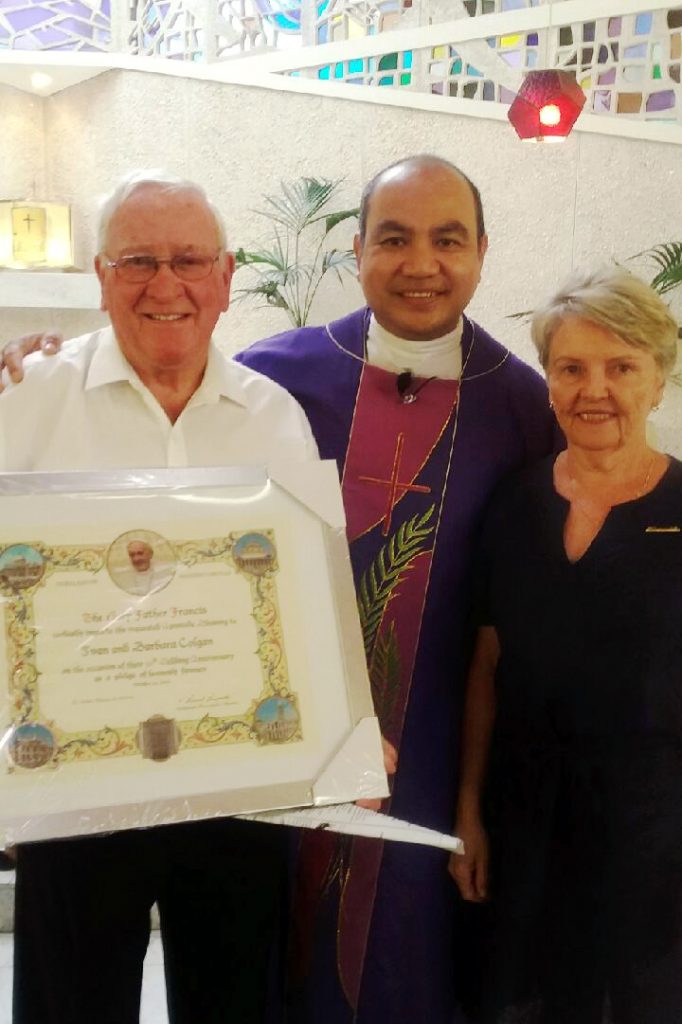 Floreat Wembley parishioners Ivan and Barbara Colgan last year recognised their 50th wedding anniversary with a particular honour, receiving a Papal Blessing which was presented to them by their Parish Priest Father Andrew Albis. Photo: Supplied
