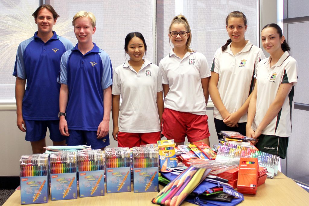 Generous Mercedes College, Santa Maria College and Trinity College students have donated their time and money during the summer holidays to help ensure that children in the care of not-for-profit organisation MercyCare have the best start to the school year. Photo: Supplied