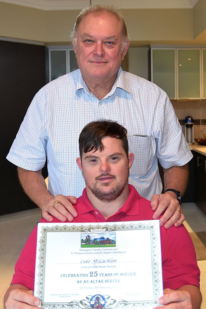 Strong father-son bond: Luke’s father Philip, serves with him at Thornlie Parish and says Luke has been a source of inspiration. Photo: Josh Low