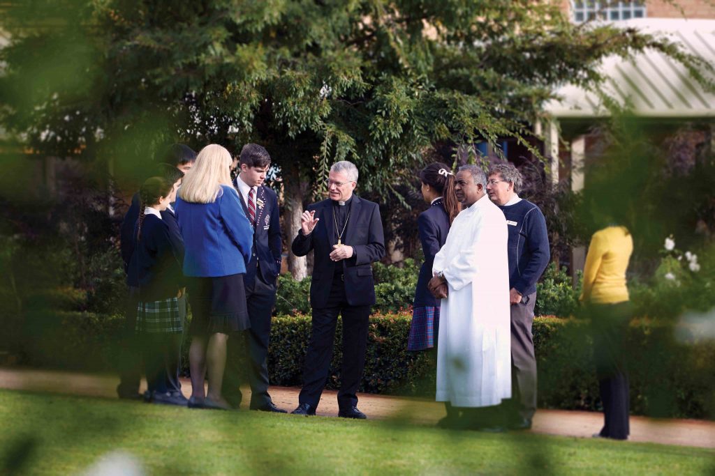 Archbishop Costelloe in discussion with students and staff of Corpus Christi College. Photo: Ron Tan