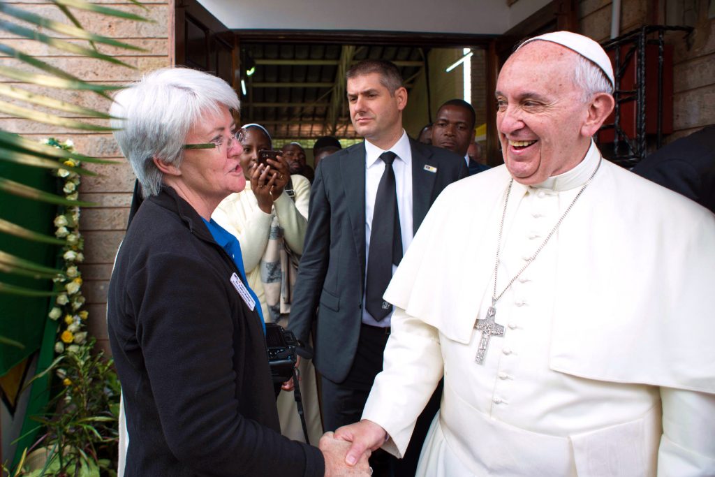 Sr Kathy with Pope Francis on his trip to the slums in Nairobi, where the Holy Father was able to dialogue with locals and reiterated the ‘moral duty incumbent on all of us’ to accompany others in their struggles. Photo: Supplied