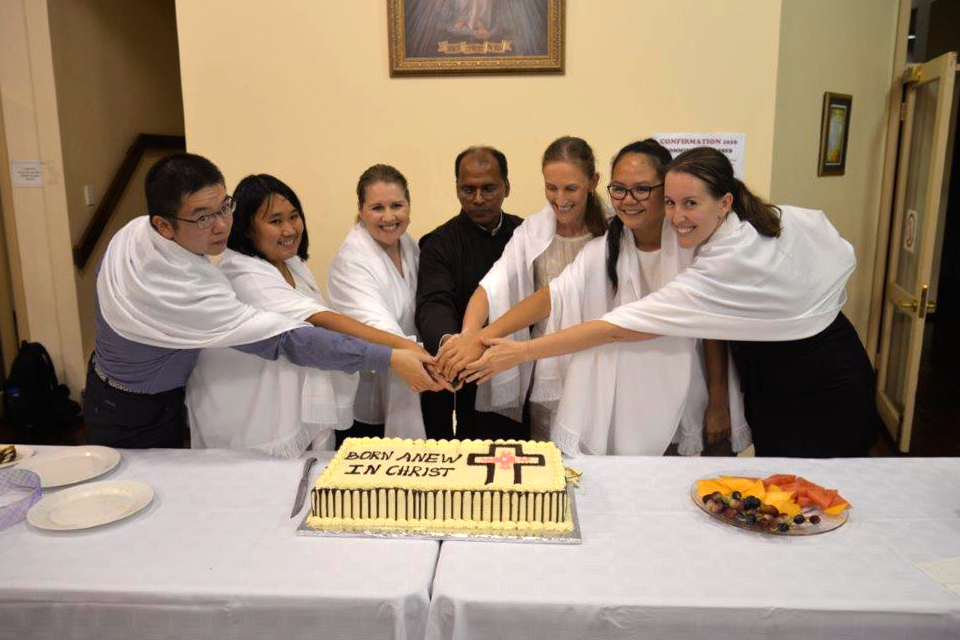 Morley parishioner Kylie Farina (third from right) celebrates her entry into the Church in 2016. Photo: Supplied