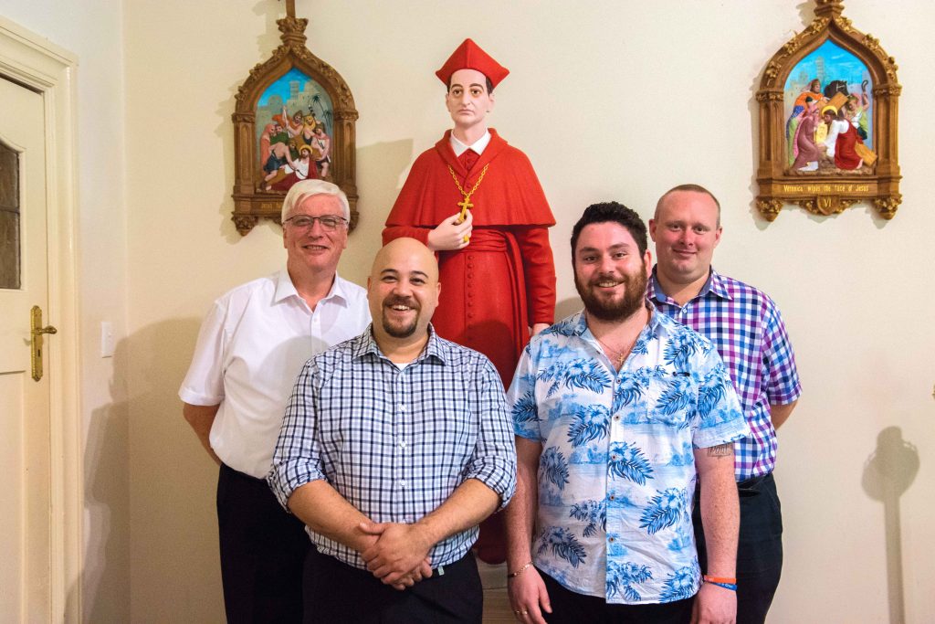Fr Philip Fleay with the new seminarians Adam Quinlivan, Nathan Barrie and Matthew Tloczek. Photo: Natashya Fernandez