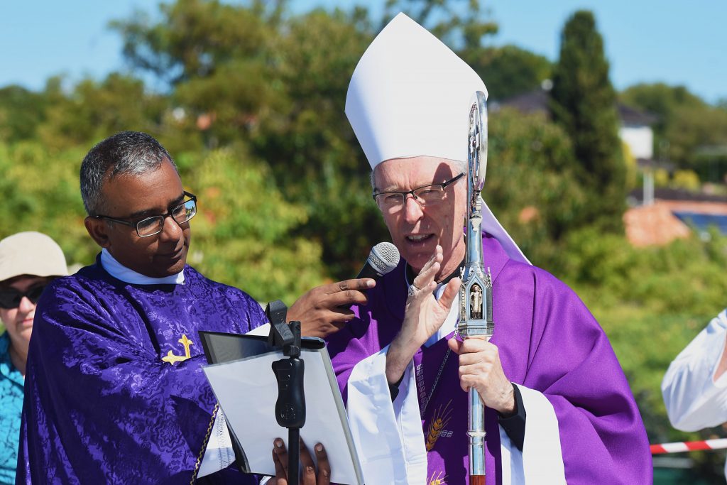 Bishop Sproxton blessed the new Church site after Mass and imparted a blessing for all those present. Photo: Josh Low.