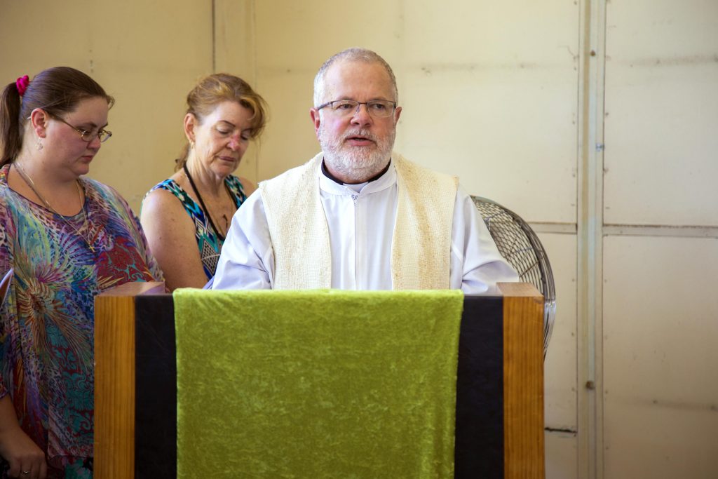 Rev Dr Joseph Parkinson proclaims the Gospel at the closing Mass of St Francis of Assisi Church East Cannington. Photo: Jamie O’Brien