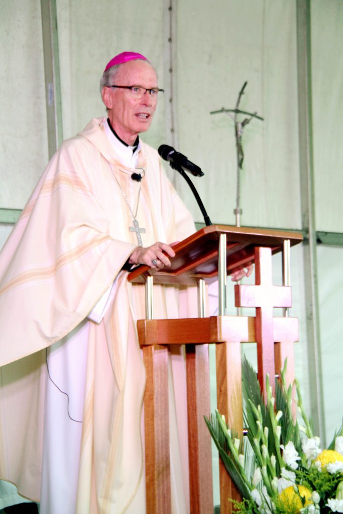 Auxiliary Bishop Donald Sproxton addressed a 3000-strong crowd recently at Newman College’s Family Mass, which celebrated the start of a new school year and the bicentenary of its founders the Marist Brothers. Photo: Supplied