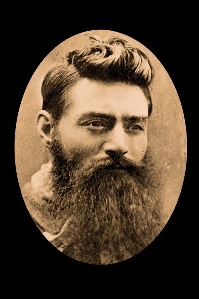 Ned Kelly, pictured the day before he was hanged in 1880, received the last rites from Bishop Matthew Gibney, after he was wounded during the siege at Glenrowan. Photo: Australian News and Information Bureau