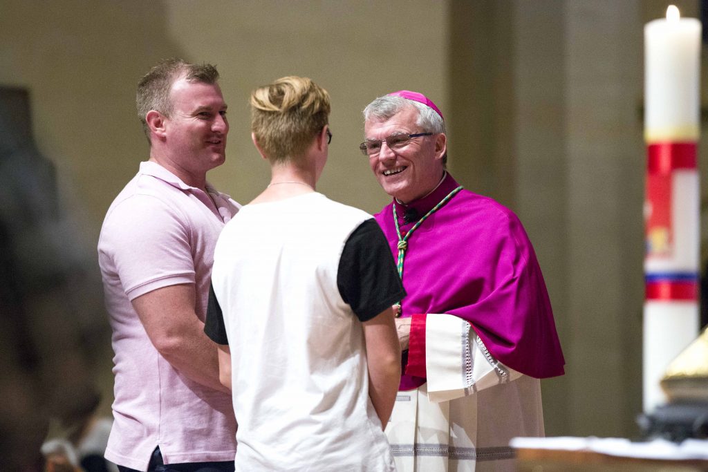 The Rite of Election of Catechumens and Formal Recognition of Candidates ceremony saw some 150 people presented alongside their sponsors, to become full members of the Catholic faith. Photo: Ron Tan