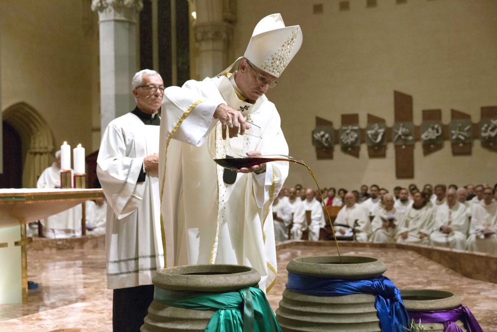 The Oil of Catechumens, Oil of the Sick and Oil of the Chrism were blessed by the Most Rev Archbishop Costelloe to be used by clergy in their Parishes throughout the year. Photo: Ron Tan