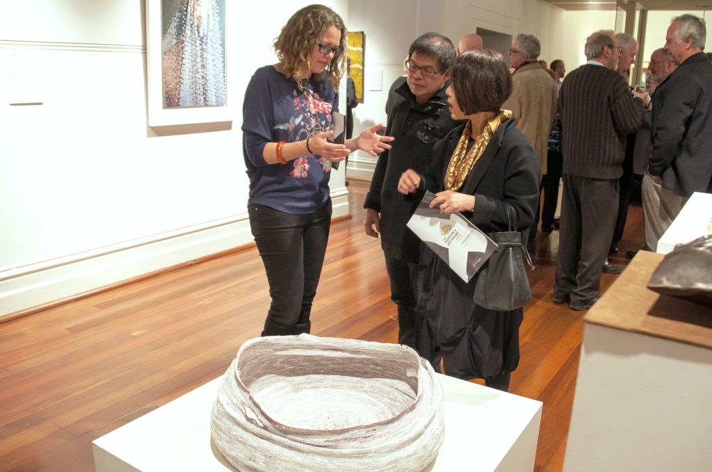 Megan Robert was awarded the acquisitive St John of God Health Care Prize at last year’s Mandorla Art Award. She is pictured with her work titled The Bread Basket at Emmaus – the Flesh returned to Word. Photo: Marco Ceccarelli