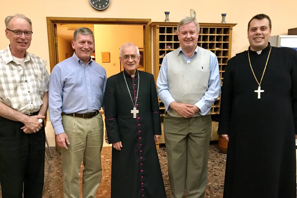 Perth Auxiliary Bishop Don Sproxton, far left, and former Auxiliary Bishop of Brisbane, Emeritus Bishop Brian Finnegan, fourth from left, with Tantur Ecumenical Institute Rector, Father Russ McDougall, and the local Syriac Catholic Bishop and Parish Priest. Photo: Gemma Thompson