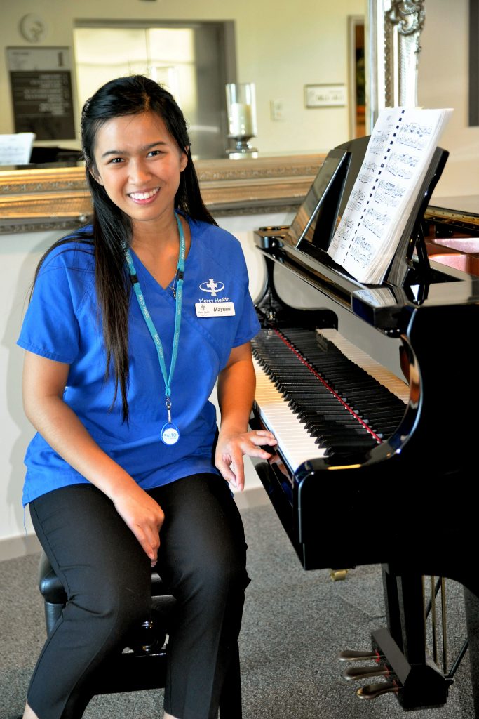Filipino-born Mayumi Morales, who has worked as a full-time carer at Mercy Place Mont Clare for the past three years, began studying at WAAPA in February. Photo: Supplied.