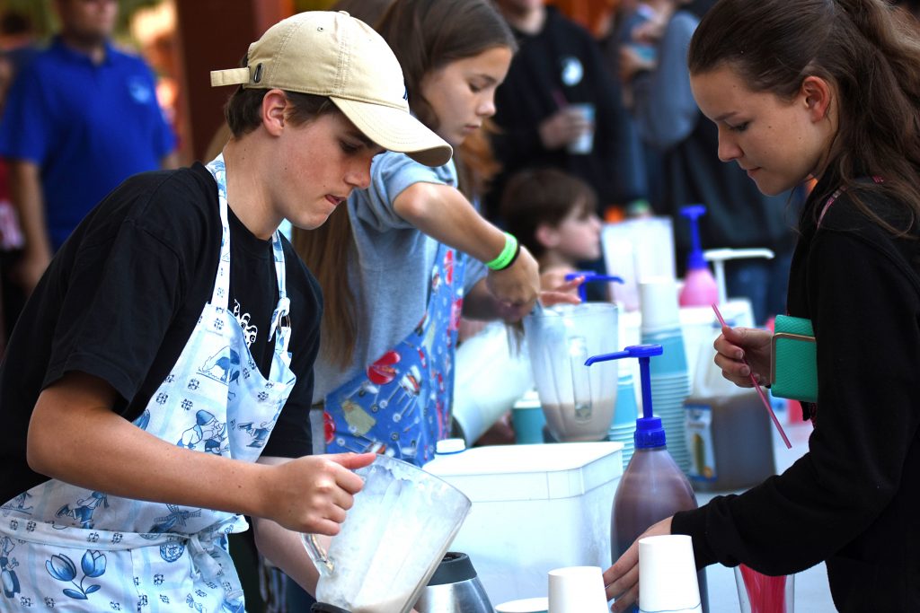 Sixty-four Pastoral Care Groups within the college came together to raise money through participating in activities, along with the sale of food and drinks, with students volunteering their time and effort at stalls. Photo: Josh Low.