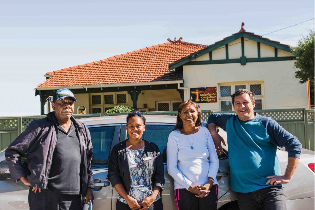 Aggie with ACM staff Donna Ryder, Reg Carnamah and Brendan Philips. ACM strives to promote the spiritual, cultural and social development of people of Aboriginal descent. Photo: Natashya Fernandez 