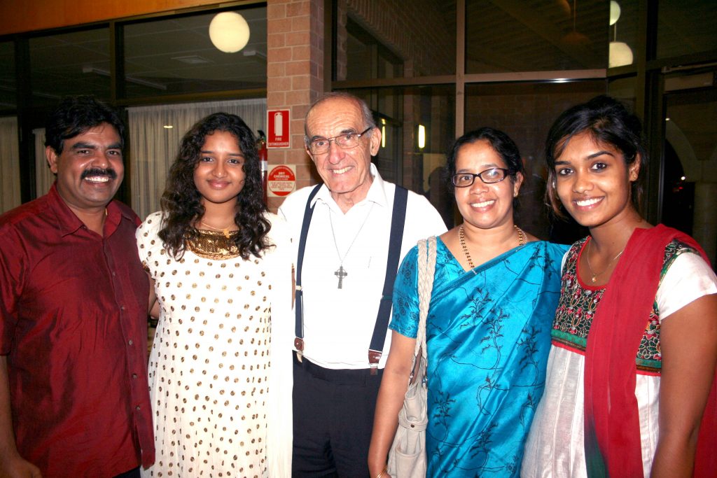 Bishop Justin Bianchini with parishioners on the celebration of Multicultural Night in 2013. Photo: Supplied.