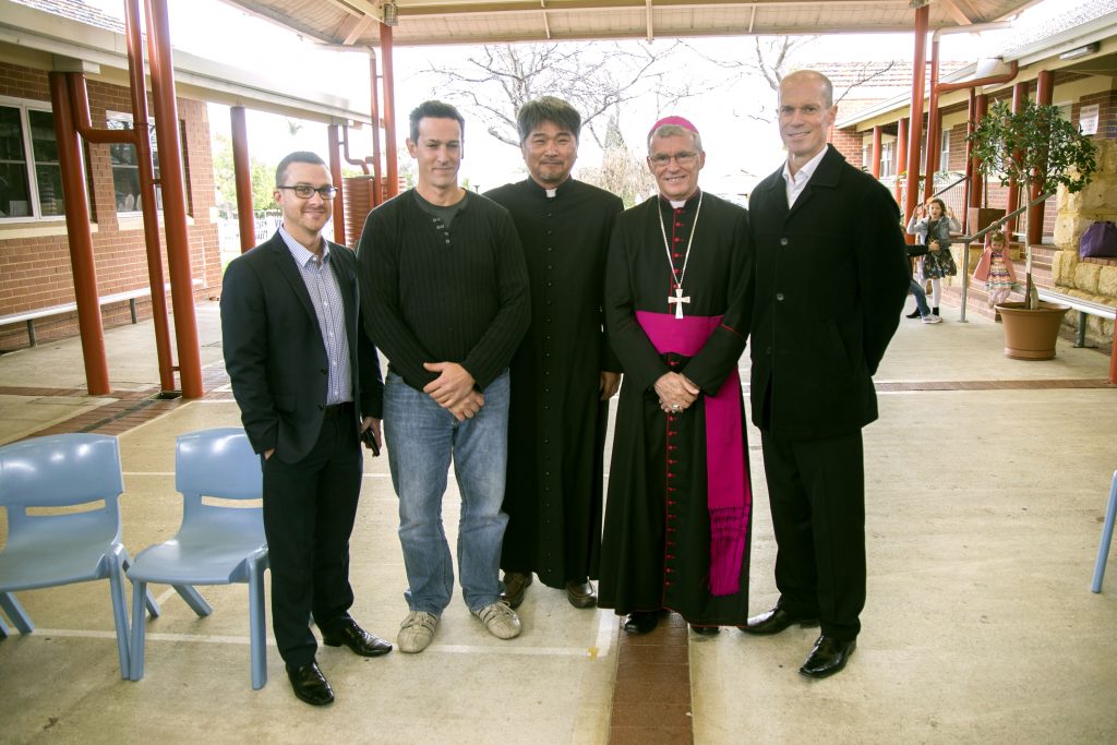 Archbishop Timothy Costelloe, second from right, with builder Ryan Secola, building Site Supervisor Sam Bruno, Scarborough Parish Priest Fr Benedict Lee (third from right) and Architect Tim Lanigan. Photo: Jamie O’Brien.