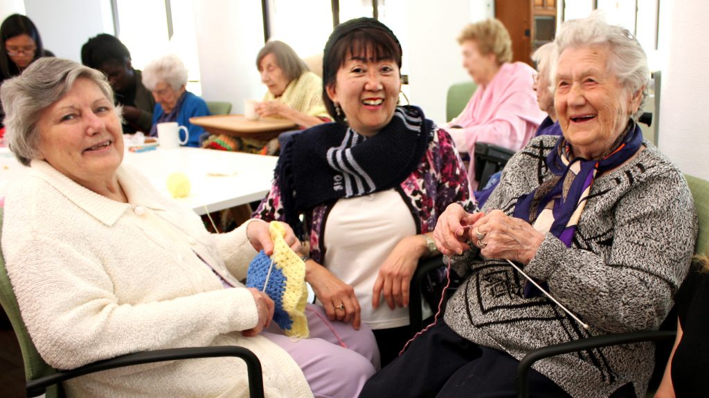 For Angela Di Mori age is no barrier, especially when it comes to handicrafts. At 100 years old, Mrs Di Mori is leading a knitting circle at MercyCare’s Residential Aged Care facility in Wembley. Photo: Supplied.