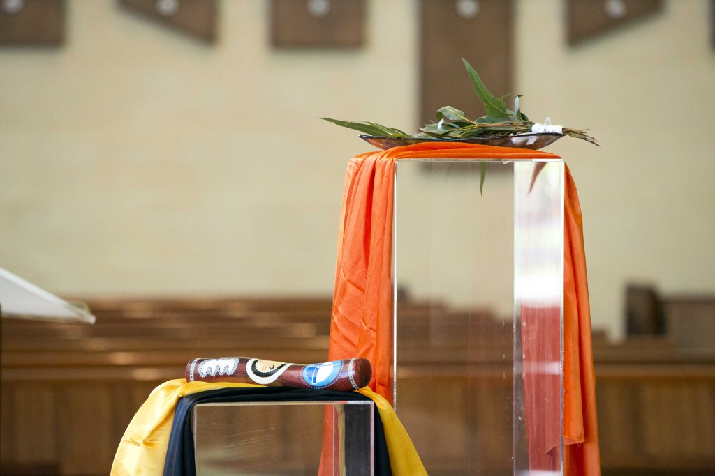 The Agency Commissioning Mass coincided with NAIDOC week, where the Aboriginal Youth Ministry staff acknowledged the ancestors of the land and carried a Message Stick to the Altar as a symbolic representation of the word being proclaimed and passed on to others. Photo: Ron Tan.