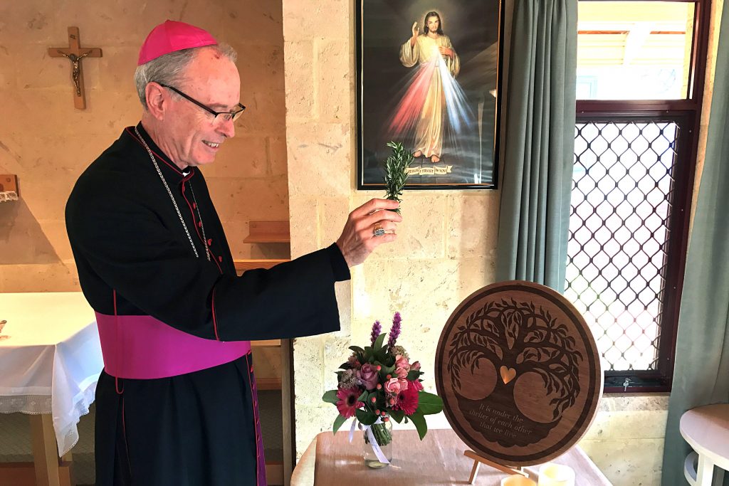 The Most Rev Bishop Sproxton blesses the plaque for the new state of the art Comfort Care Centre. Photo: Supplied.