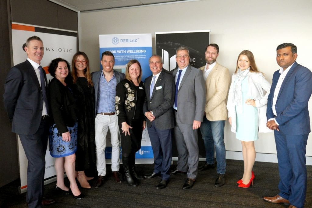 Members of the Access Wellbeing Services team at the launch of the ReSILnZ app (Left to Right) Rod West, Carolyn Padua, Coby Greer, Brendan Collins, Catherine Spini, Tony Pietropiccolo AM, Clive Elliott, Luca Lucioli, Valery and Ti-roo. Photo: Supplied.