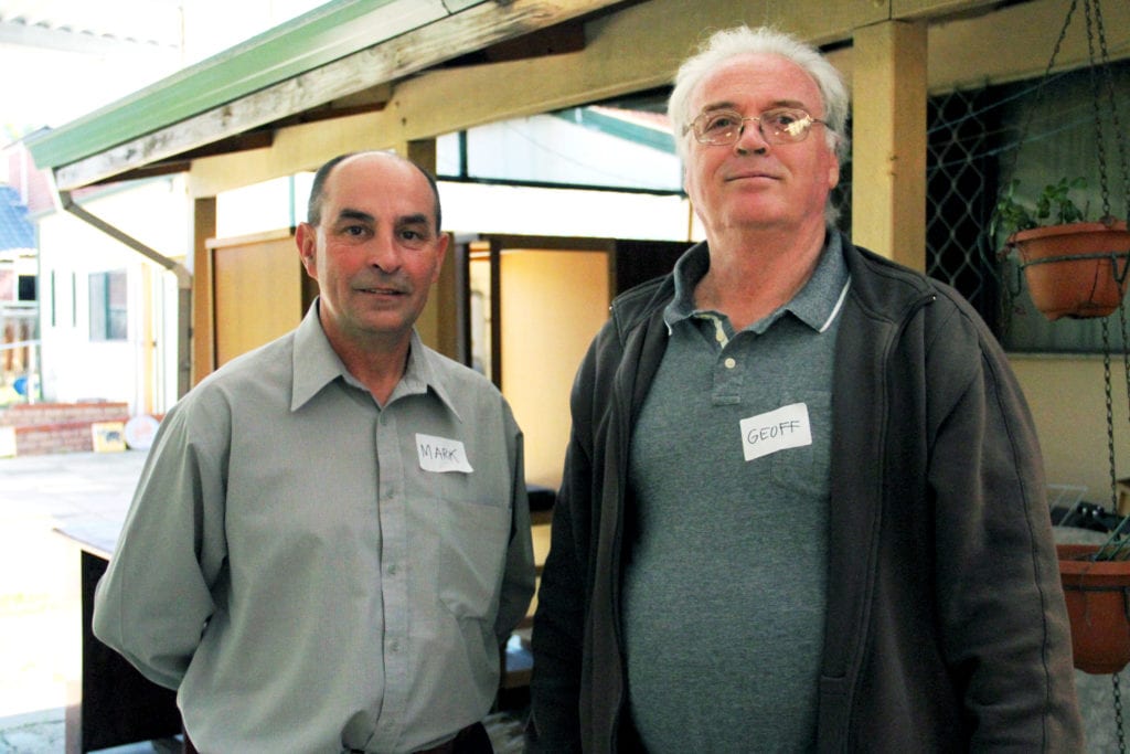 Fr Mark James with Geoff Scott (deaf) who teaches art at Emmanuel Centre. Photo: Theresia Titus.