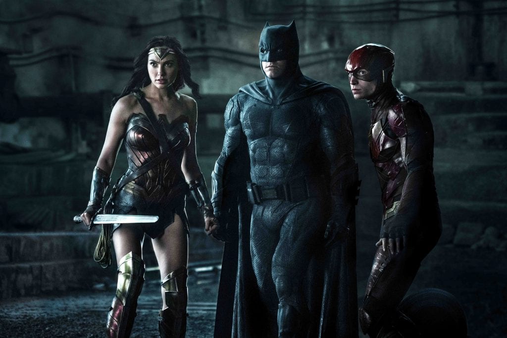 Gal Gadot, Ben Affleck and Ezra Miller star in a scene from the movie "Justice League." Photo: CNS photo/Warner Bros.