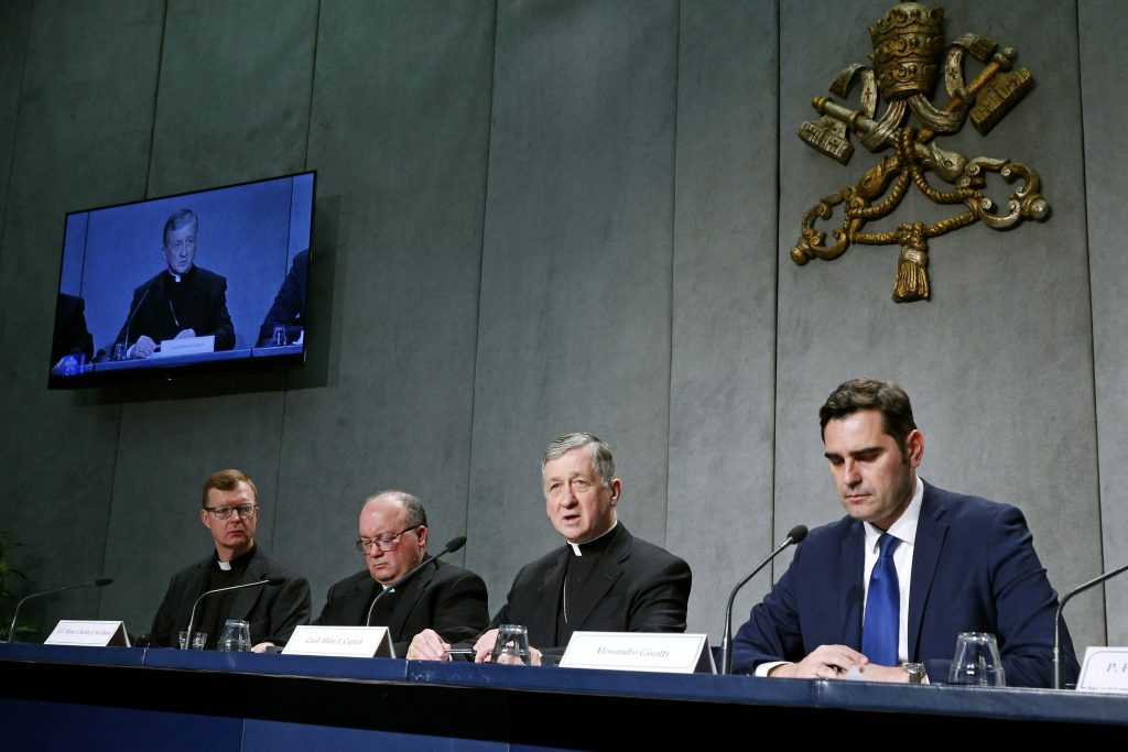 Jesuit Father Hans Zollner, Archbishop Charles J Scicluna of Malta and Cardinal Blase J Cupich of Chicago, all members of the organising committee for the 21 to 24 February Vatican meeting on the protection of minors in the Church, attend a press conference with Vatican spokesman Alessandro Gisotti to preview the meeting. Photo: Paul Haring/CNS.