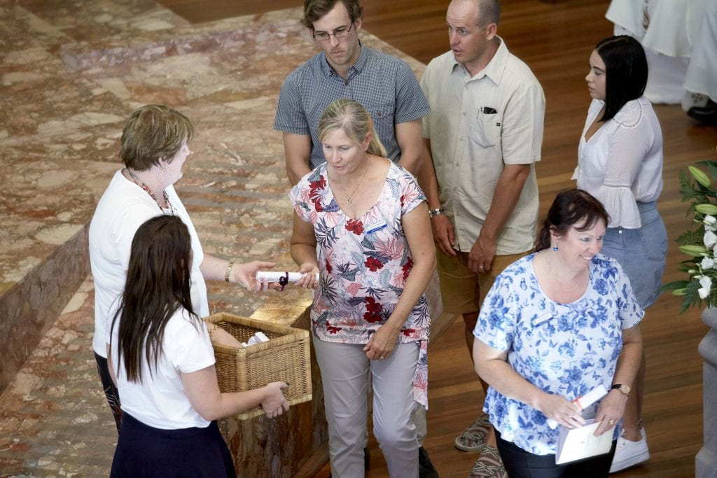 A total of 225 new and transferring school staff were welcomed to Catholic Education Western Australia (CEWA) on 1 February as they collect their scrolls blessed by the Archbishop of Perth. Photo: Ron Tan.