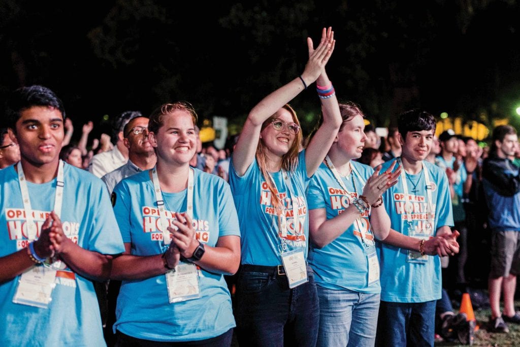 Youth react to the announcement of Perth as the host of ACYF for 2019 during the final Mass of ACYF 2017, held in Sydney. Photo: Cyron Sobrevinas.
