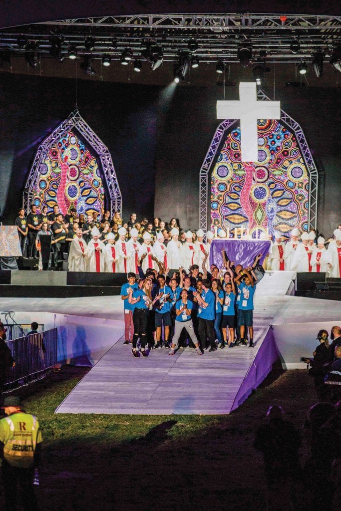 Perth youth celebrate on the main stage following the announcement that Perth is the next host venue for ACYF 2019. Photo: Alphonsus Fok.