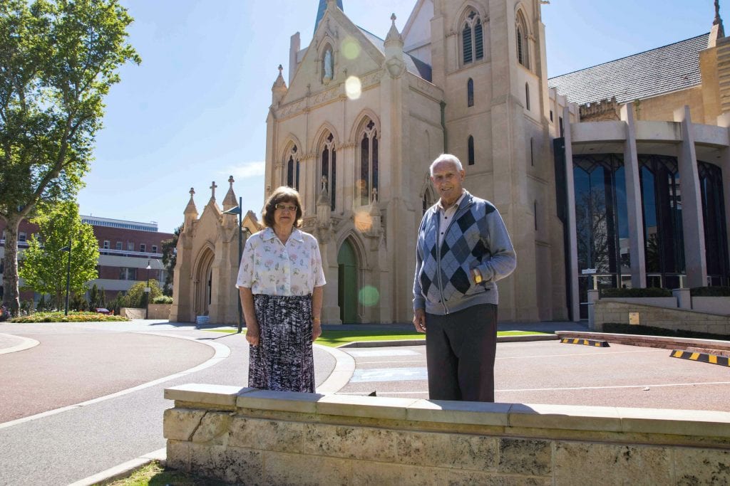 Tom Mahady (right) often fills in as an acolyte when needed. Photo: Matthew Lau.