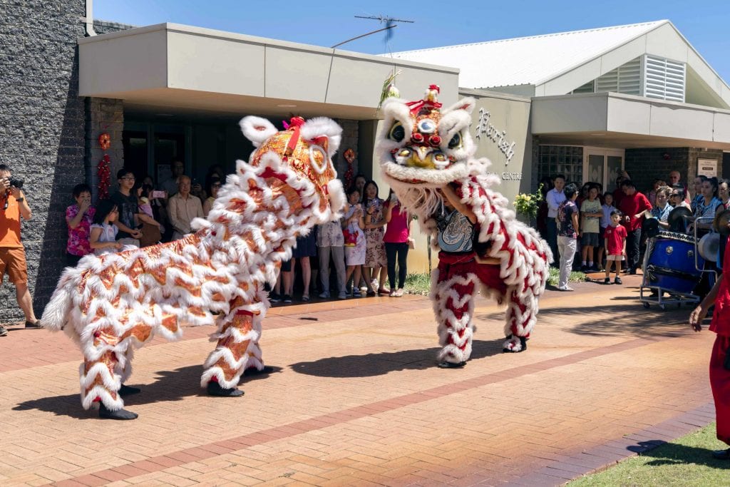The Chinese Community Centre Lion Dance Troupe WA entertained those present for CNY with a traditional lion dance outside St Pius X Church. Photo: Matthew Lau.