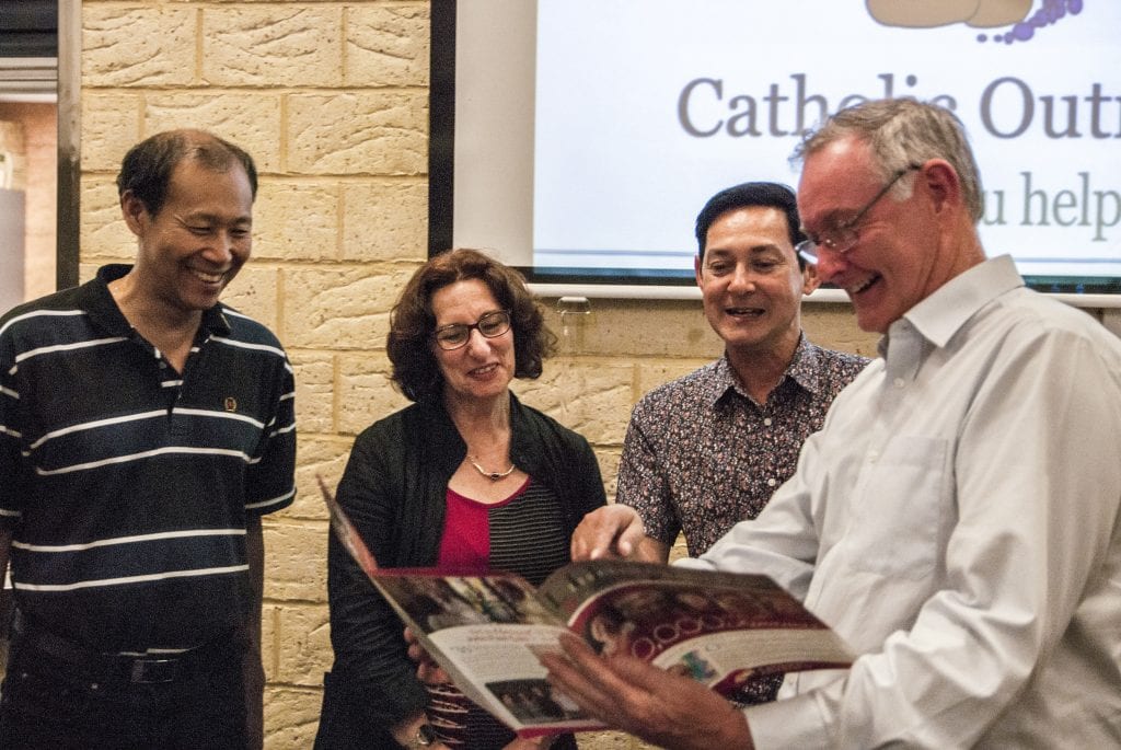 Peter McMinn (right) and co at Catholic Outreach’s 2015 Christmas Appeal Promotion. Photo: The Record.