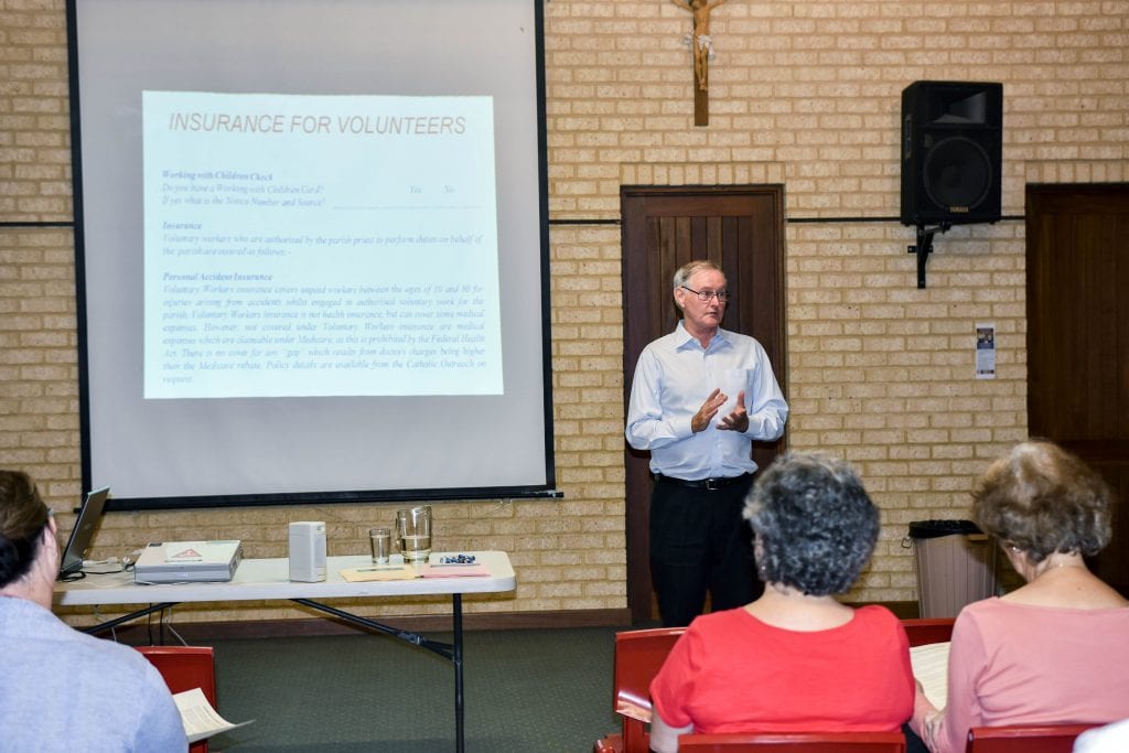 Peter McMinn addresses an Ocean Reef Parish audience in 2017. Photo: The Record.