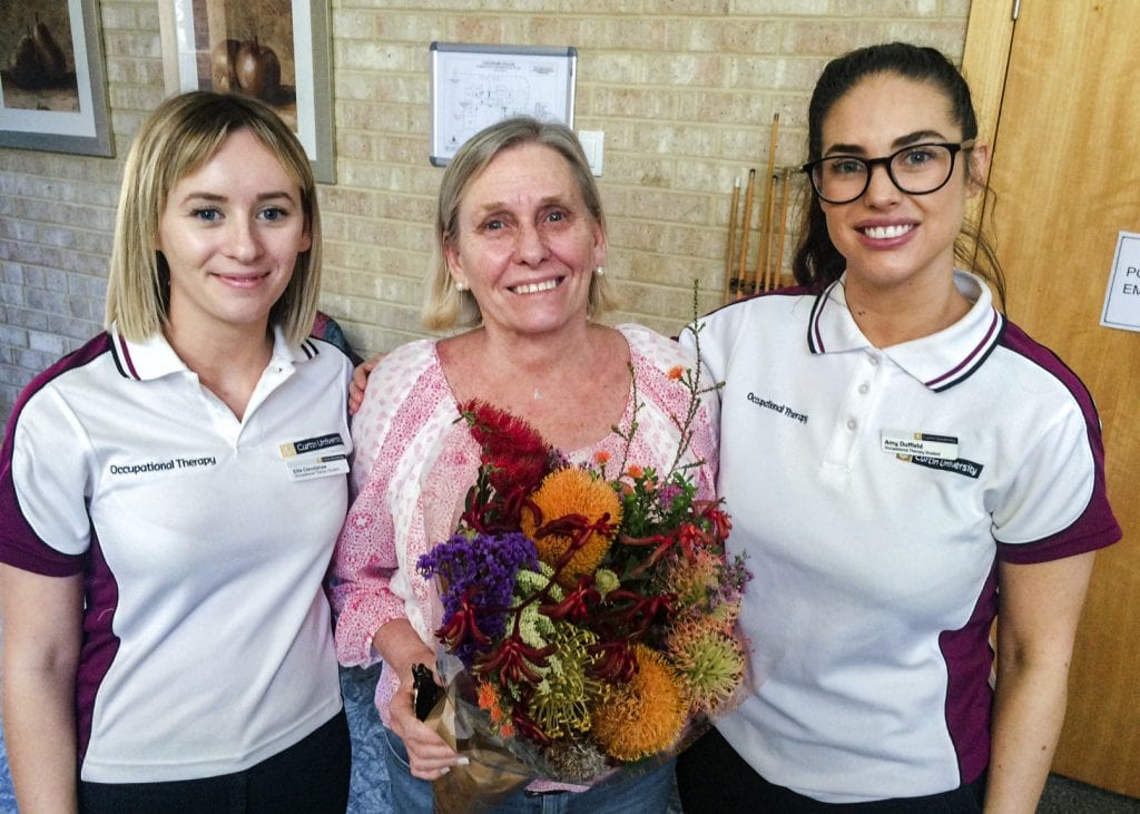 Students Ellie Clemitshaw and Amy Duffield with Keith Glance’s wife Wendy. Photo: Supplied.