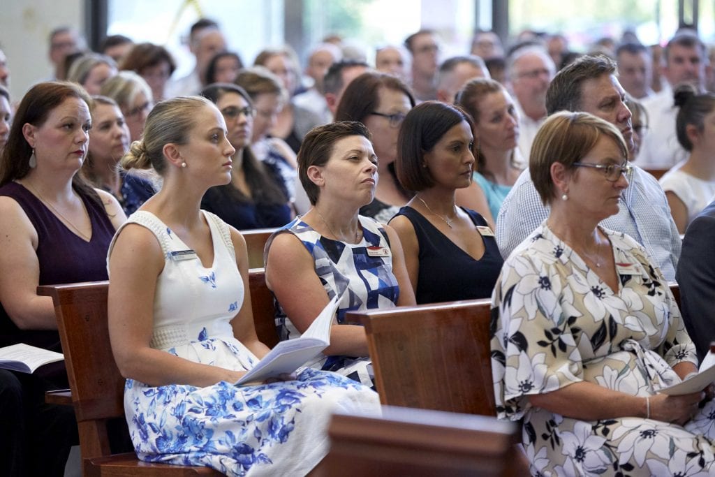 CEWA staff listen to Archbishop Costelloe’s words of wisdom at St Mary’s Cathedral on Friday 1 February. Photo: Ron Tan.