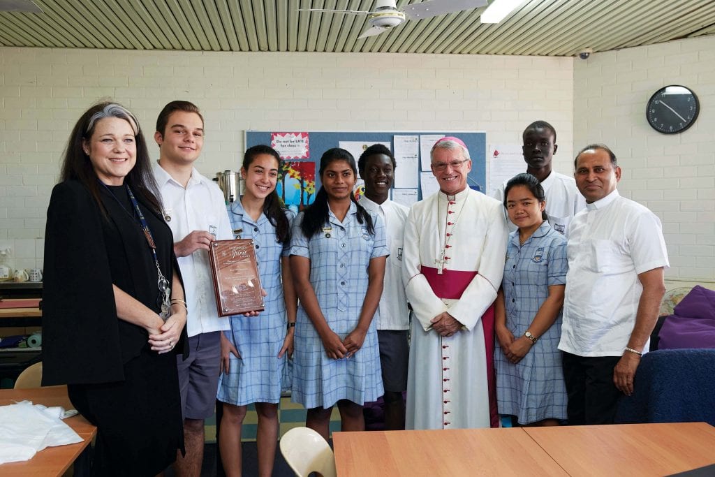 Archbishop Timothy Costelloe with Fr Albert Saminedi and Mercy College students and staff at the 2018 Lifelink Spirit Award. Photo: Ron Tan.