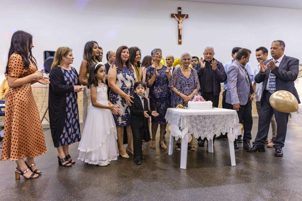 Adriana Carvalho, who recently turned 100, pictured with her family at Good Shepherd Catholic School in Lockridge on 3 March. Photo: Eric Martin.