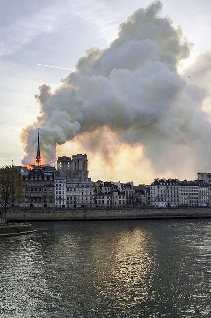 Flames and smoke billow from the Notre Dame Cathedral after a fire broke out in Paris on 15 April 2019. Officials said the cause was not clear, but that the fire could be linked to renovation work. Photo: Julie Carriat/Reuters.