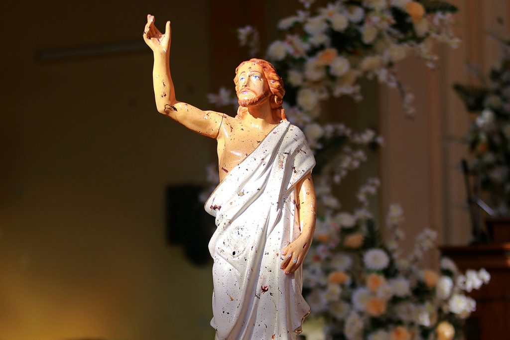 A blood-stained statue of Christ is seen after a bombing at St Sebastian Church in Negombo, Sri Lanka on 21 April 2019. Photo: Reuters/CNS.