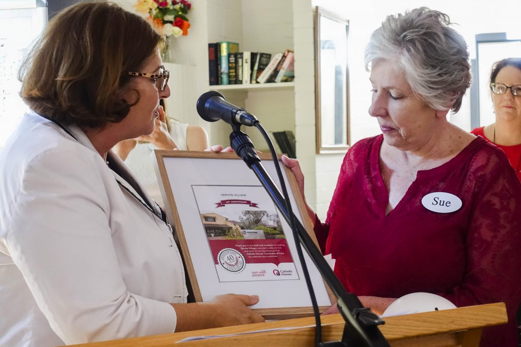 Catholic Homes’ Board Member, Marina Re and Servite Facility Manager, Sue Elliott celebrate Servite Village’s 40th anniversary. Photo: Carmen Jenner. 