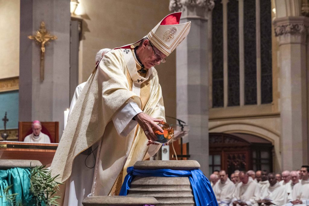 Archbishop Costelloe blessed the Holy Oils, all of which will be used for Sacraments of Confirmation, Ordination, Anointing of the Stick and Baptism in the coming year. Photo: Matthew Lau.