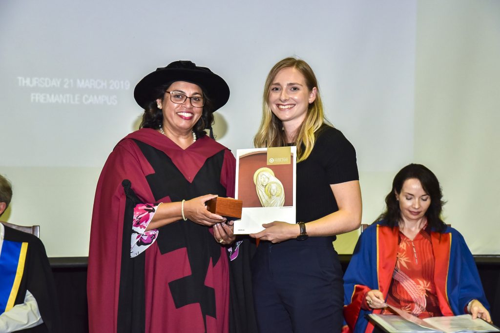 Head of Fremantle Campus Professor Selma Alliex presents the University Medal to Alexandra Brindley. Photo: Supplied.