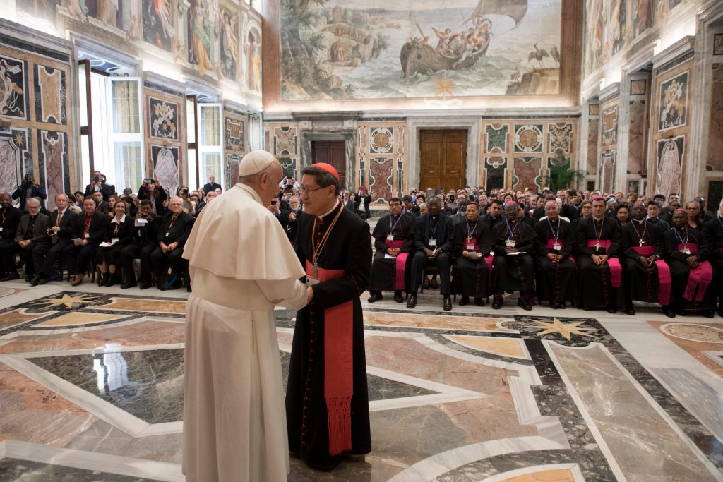 Philippine Cardinal Luis Antonio Tagle of Manila, president of the Catholic Biblical Federation, greets Pope Francis on 26 April at the Vatican during a special audience marking the federation's 50th anniversary. Photo: Vatican Media/CNS.