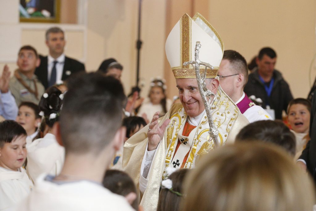 Pope Francis greets children after celebrating a Mass with first Communion at the Church of the Sacred Heart in Rakovski, Bulgaria on 6 May Photo: Paul Haring/CNS.