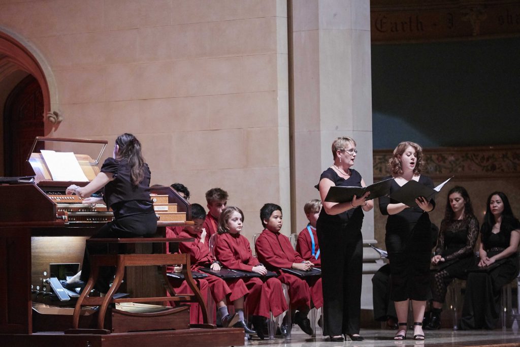 Sopranos Catherine Campbell and Emma Oorschot sing at the “Resurrexit” benefit concert for Notre Dame Paris. Photo: Ron Tan.