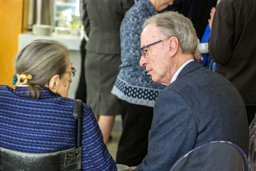 Perth Auxiliary Bishop Donald Sproxton participated in the event. He is seen interacting with a relative of Dr Kovesi during the lunch break gathering on 18 April at the St Mary’s Cathedral. Photo: Amanda Murthy.