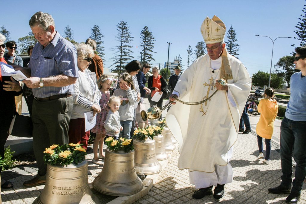 Bishop of Geraldton Michael Morrissey blesses the new carillon. Photo: Supplied.
